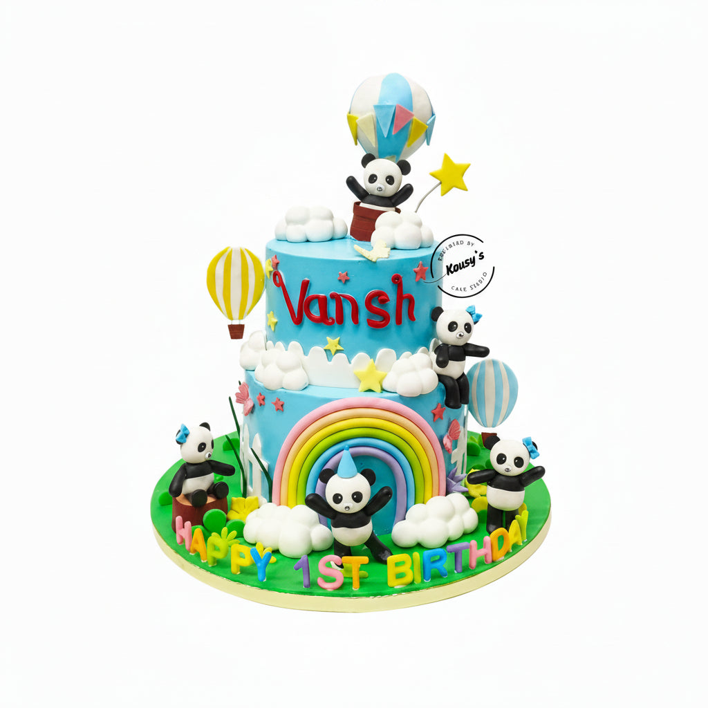 Colorful birthday cake with panda decorations and 'Vansh' written on it.