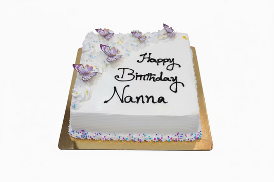 Birthday cake with butterfly decorations on a white background